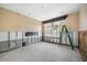 Spacious living room featuring a large window and partial construction work in progress at 540 115Th Ave, Treasure Island, FL 33706
