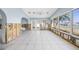 Open living space with tile floors, arched doorways, and waterfront views at 540 115Th Ave, Treasure Island, FL 33706