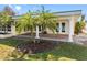 Covered patio with columned supports and views of the waterfront at 540 115Th Ave, Treasure Island, FL 33706