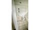 Functional bathroom with essential fixtures, ready for renovation, offering practical potential for upgrades at 5715 Townhouse Dr # 1, New Port Richey, FL 34652