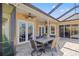 Covered patio with an outdoor dining area, perfect for entertaining guests at 6181 9Th Avenue Ne Cir, Bradenton, FL 34212