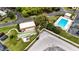 Aerial view of the pool and recreation area with shuffleboard courts at 6188 Chesham Dr # 5, New Port Richey, FL 34653