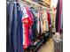 Walk-in closet features ample hanging space and shelving for optimal organization at 6188 Chesham Dr # 5, New Port Richey, FL 34653