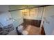 Bathroom with shower and toilet in need of renovation for a personal touch at 6526 Senegal Palm Way, Apollo Beach, FL 33572