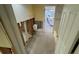 Bathroom in the midst of renovations featuring new tile and a toilet with a view to the patio at 6526 Senegal Palm Way, Apollo Beach, FL 33572
