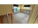 Bright bedroom with large window offers a blank canvas for customization at 6526 Senegal Palm Way, Apollo Beach, FL 33572