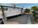 Waterfront property featuring a boat lift and scenic views at 6526 Senegal Palm Way, Apollo Beach, FL 33572