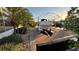 Private dock with boat lift ready for enjoying the waterfront lifestyle at 6526 Senegal Palm Way, Apollo Beach, FL 33572