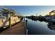 Private dock on the canal, perfect for boating and enjoying waterfront views at 6526 Senegal Palm Way, Apollo Beach, FL 33572