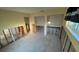 Spacious area under renovation with views of the bathroom, closet and multiple windows at 6526 Senegal Palm Way, Apollo Beach, FL 33572