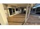 Enclosed lanai with neutral colors and views to the outdoor pool and waterfront at 6526 Senegal Palm Way, Apollo Beach, FL 33572