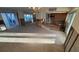 Open-concept living space with tile flooring and natural light streaming through the windows at 6526 Senegal Palm Way, Apollo Beach, FL 33572