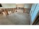 Spacious living room features new tile flooring with open layout ready for customization at 6526 Senegal Palm Way, Apollo Beach, FL 33572