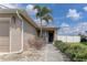 Exterior of a home with a two-car garage, walkway, and fresh landscaping at 6632 Laxey Ct, Zephyrhills, FL 33541