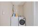 A practical laundry room equipped with a modern washer and dryer at 904 Woodland Dr, Seffner, FL 33584