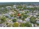 Aerial view of a home in a neighborhood located close to shopping and schools at 9044 Lynwood Dr, Seminole, FL 33772