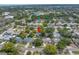 Aerial view of neighborhood, house indicated by red arrow at 9044 Lynwood Dr, Seminole, FL 33772