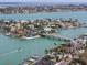 Beautiful island community with waterfront properties, docks, and a bridge connecting to the mainland, close to beaches at 106 23Rd Ave, St Pete Beach, FL 33706