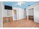 Bright bedroom featuring wood floors, closet, and entry to bathroom at 106 23Rd Ave, St Pete Beach, FL 33706