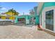 Exterior showcasing open garage at 106 23Rd Ave, St Pete Beach, FL 33706