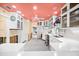 Spacious kitchen with modern white cabinets, countertops, and stainless steel fixtures at 106 23Rd Ave, St Pete Beach, FL 33706