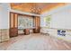 Sunroom with wood ceiling featuring built-in desk and cabinets ready for renovation at 106 23Rd Ave, St Pete Beach, FL 33706