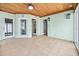 Spacious sunroom with tile flooring and multiple doors at 106 23Rd Ave, St Pete Beach, FL 33706