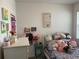 Bedroom featuring an array of stuffed animals and decorations at 11833 Clare Hill Ave, Riverview, FL 33579