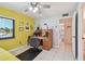 Bright office space with desk and view to kitchen area at 12300 Vonn Rd # 2204, Largo, FL 33774