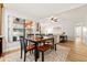 Bright dining area with a view of the pool area and seamless integration with the living space at 12762 98Th St, Largo, FL 33773