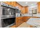 Modern kitchen featuring stainless steel appliances and sleek countertops at 12762 98Th St, Largo, FL 33773