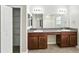 Bathroom featuring double sinks, vanity, tile flooring, and a walk-in closet at 14050 Arbor Pines Dr, Riverview, FL 33579