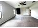Large bedroom with carpet, natural light, and an open doorway at 14050 Arbor Pines Dr, Riverview, FL 33579