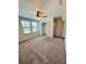 Bedroom featuring a ceiling fan, bright windows, and a standard closet at 14050 Arbor Pines Dr, Riverview, FL 33579