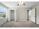 Bedroom featuring a spacious closet and a large window at 14050 Arbor Pines Dr, Riverview, FL 33579
