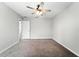Bedroom with ceiling fan and neutral walls and plush carpet flooring at 14050 Arbor Pines Dr, Riverview, FL 33579
