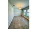 Dining room has tile floors, modern light fixture, and windows for plenty of light at 14050 Arbor Pines Dr, Riverview, FL 33579