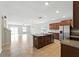 Kitchen with stainless steel appliances, center island and an open floorplan at 14050 Arbor Pines Dr, Riverview, FL 33579