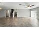 Open living space showcasing tile flooring and staircase at 14050 Arbor Pines Dr, Riverview, FL 33579