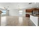 Open living space featuring tile flooring and a lake view at 14050 Arbor Pines Dr, Riverview, FL 33579