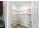 Walk-in pantry with wire shelving at 14050 Arbor Pines Dr, Riverview, FL 33579