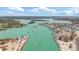 Beautiful coastal view of turquoise waters, boats, with houses lining the coast at 1423 Venetia St, Nokomis, FL 34275