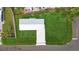 Aerial view of home showcasing the well-maintained lawn at 1423 Venetia St, Nokomis, FL 34275