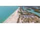 Breathtaking ocean view with sandy beaches, parked cars and boats sailing nearby a shoreline at 1423 Venetia St, Nokomis, FL 34275
