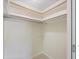Walk in closet with built in shelving at 1531 Picardy Cir, Clearwater, FL 33755