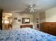 Comfortable bedroom with large bed, wood dresser, and bright natural light at 1710 7Th Sw St # 24, Ruskin, FL 33570