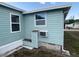Home exterior with small window air conditioning unit at 1710 7Th Sw St # 24, Ruskin, FL 33570