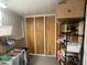 This storage space features shelving and a wardrobe at 1710 7Th Sw St # 24, Ruskin, FL 33570