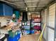 This storage space includes shelving units and plastic storage bins at 1710 7Th Sw St # 24, Ruskin, FL 33570