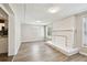 Bright living room with updated floors, recessed lighting, and fireplace at 1764 St Croix Dr, Clearwater, FL 33759